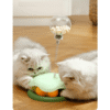 Spring-Loaded Cat Treat Dispenser and Play Toy